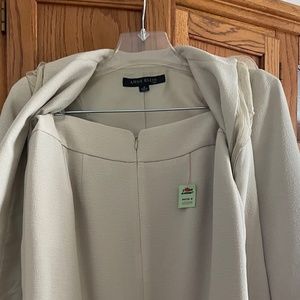 Two piece skirt and full length jacket set